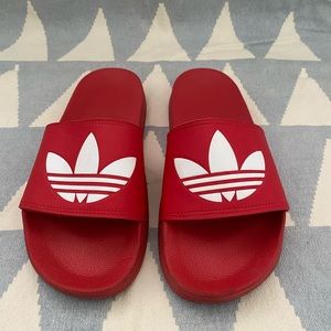 Men’s Adidas slides ( size M 7 )